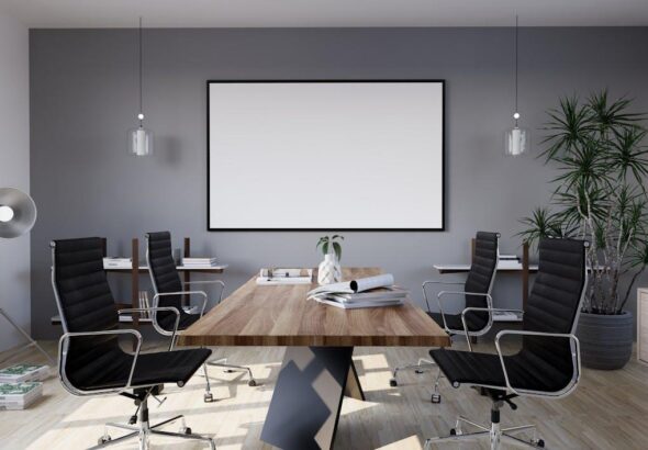 Free A modern conference room with a large screen Stock Photo